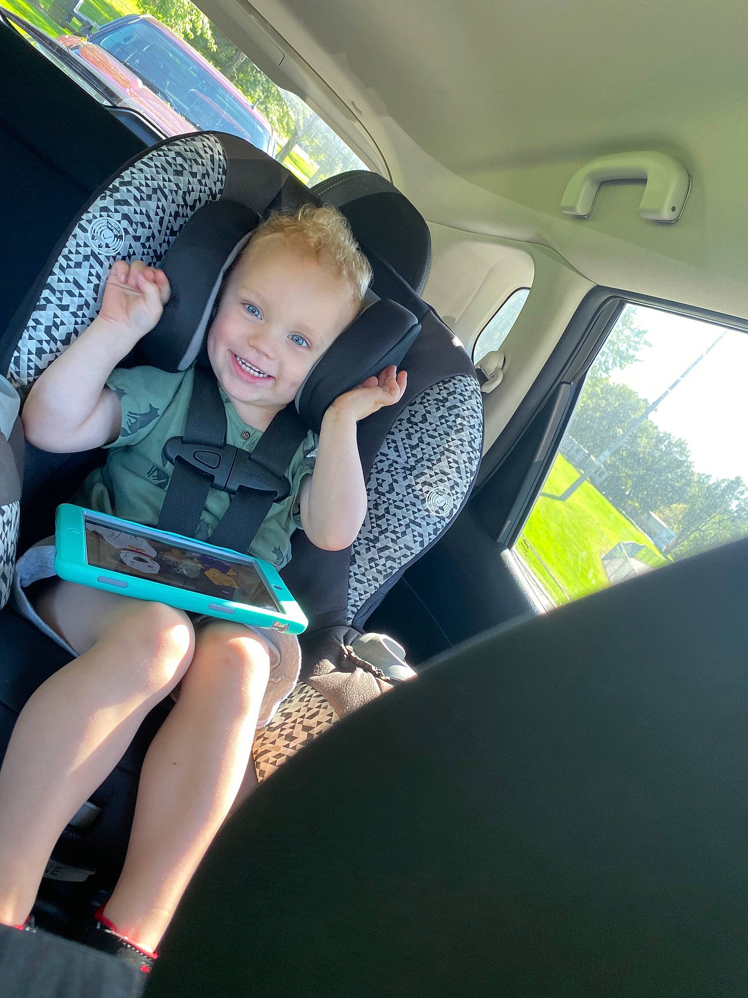 Brecken joined the competition — help win amazing prizes! auto_part, car, car_seat, child, family_car, fun, joy, leg, person, smile, toddler, vacation, vehicle