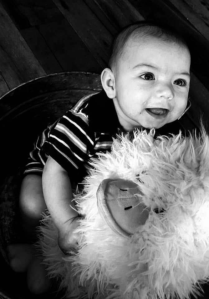 Maddoux is registered to the contest to win money with this photo: baby, black, black_and_white, child, eye, face, flash_photography, fur, head, monochrome, monochrome_photography, nose, person, photography, portrait, portrait_photography, smile, stock_photography, teddy_bear, toddler