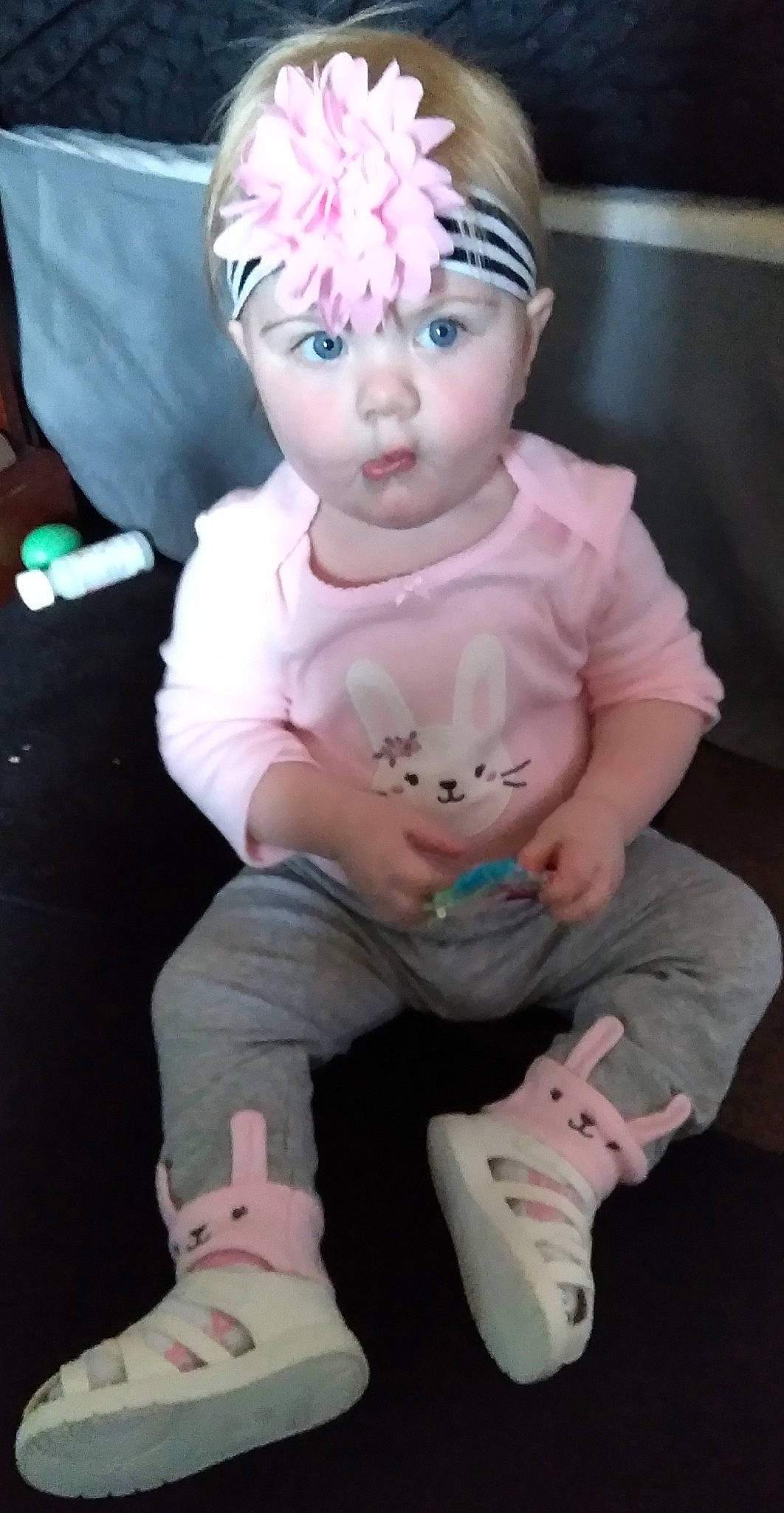 Kamora joined the competition — help win amazing prizes! baby, baby_toddler_clothing, cap, costume_hat, doll, eye, eyelash, finger, headband, headpiece, headwear, iris, jewellery, leg, magenta, person, pink, sitting, sleeve, sock