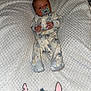 Pharaoh is registered to the contest to win money with this photo: baby, pacifier, blanket, pajamas, infant, face, stitch, cartoon, cute, sleepwear, sleeping, lying, soft, cozy, child, newborn, comfort, pattern, fabric, portrait