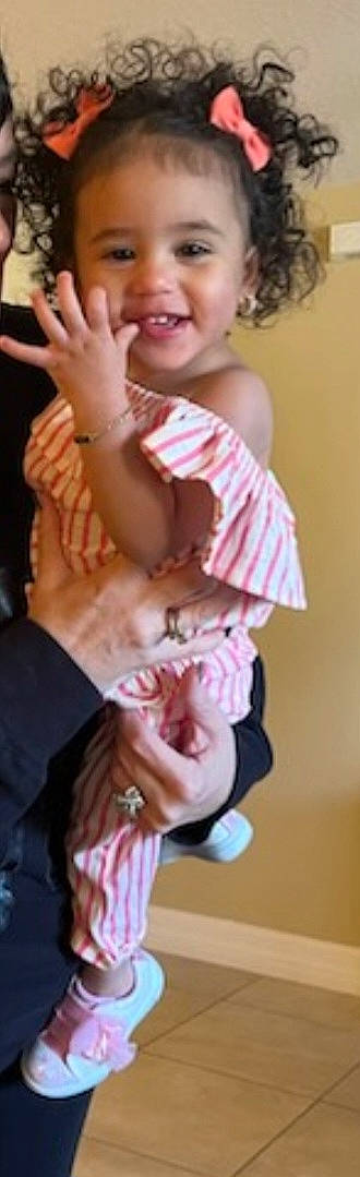 Zuri joined the competition — help win amazing prizes! abdomen, arm, baby, baby_toddler_clothing, chest, ear, elbow, finger, gesture, hand, happy, joy, knee, nail, person, sleeve, smile, stomach, thigh, thumb