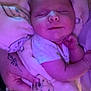 baby, blanket, bear_pattern, sleeping, infant, hand, tattoo, cozy, purple_light, soft, peaceful, wrapped, cute, newborn, person, skin, clothing, gesture, resting, comfort