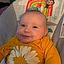 Salem joined the competition — help win amazing prizes! baby, baby_seat, child, clothing, colorful, comfort, cozy, cute, daisy, face, happy, indoor, infant, monkey, portrait, rainbow, seat, smiling, sun, yellow_shirt