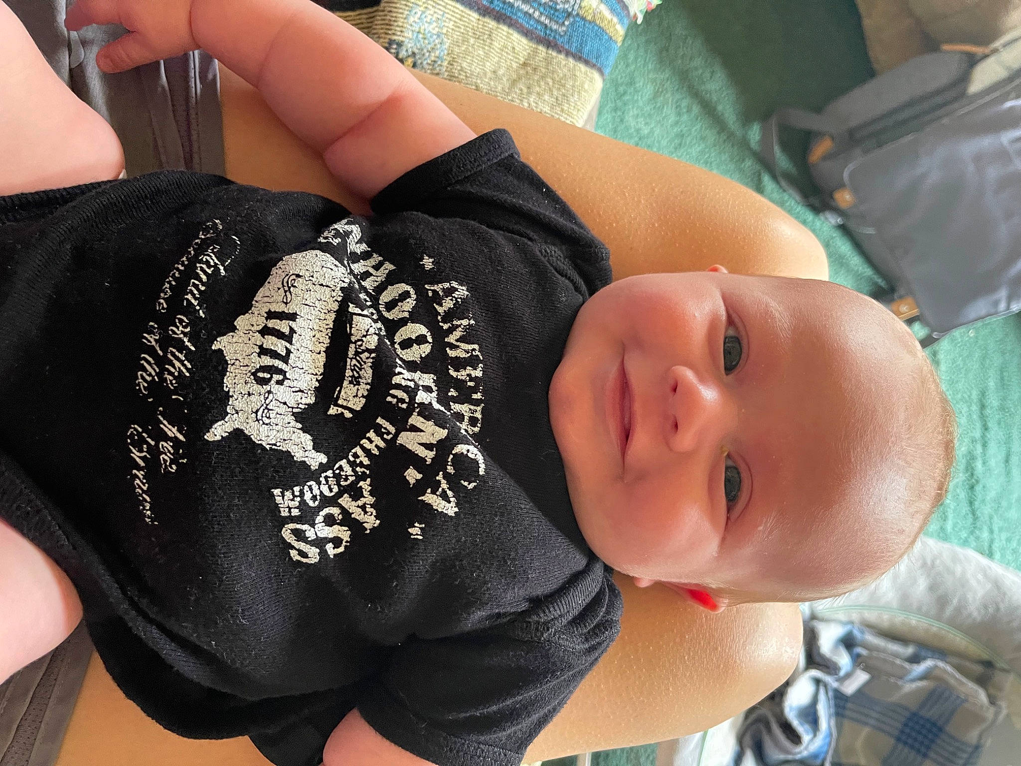 Collin is registered to the contest to win money with this photo: baby, baby_toddler_clothing, cheek, chest, comfort, cool, elbow, finger, hand, human_body, joint, joy, nail, neck, person, product, sleeve, thigh, thumb, toddler