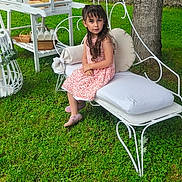 Loona participe au concours pour gagner de l'argent avec cette photo : bench, casual, child, cushion, daylight, decor, dress, furniture, girl, grass, greenery, nature, outdoor, portrait, sitting, summer, tree, white, wrought_iron, young