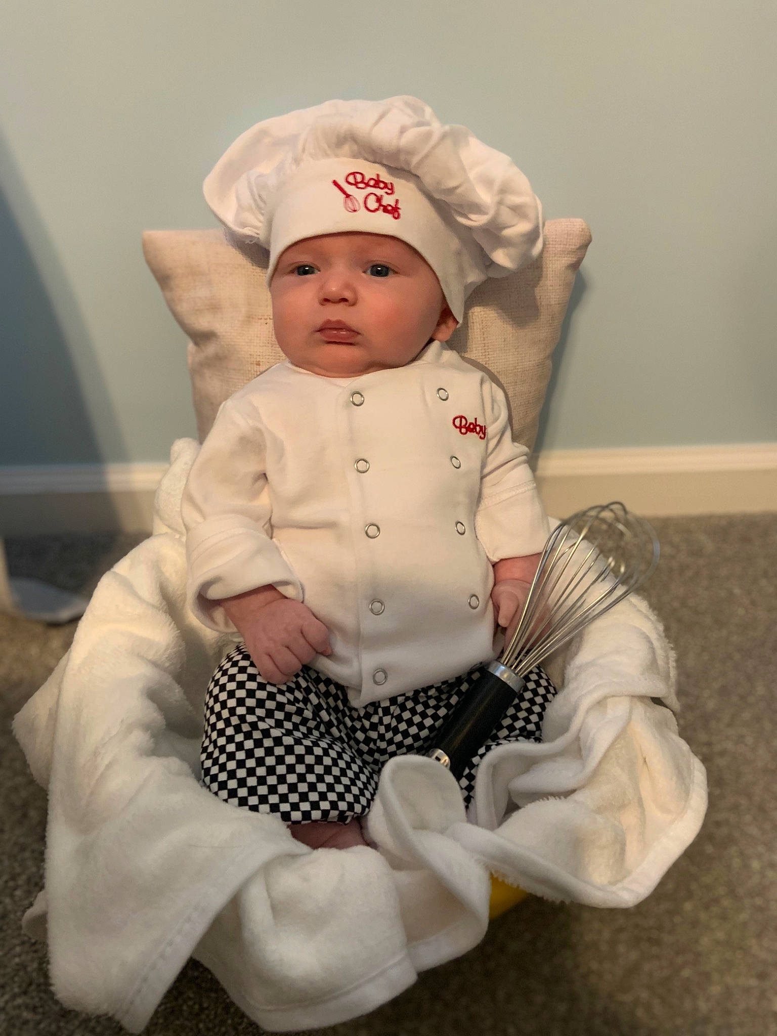 Jayden joined the competition — help win amazing prizes! arm, baby, baby_products, baby_toddler_clothing, cap, cheek, comfort, dress, eye, face, happy, hat, head, headwear, human_body, knee, lip, outerwear, person, sitting