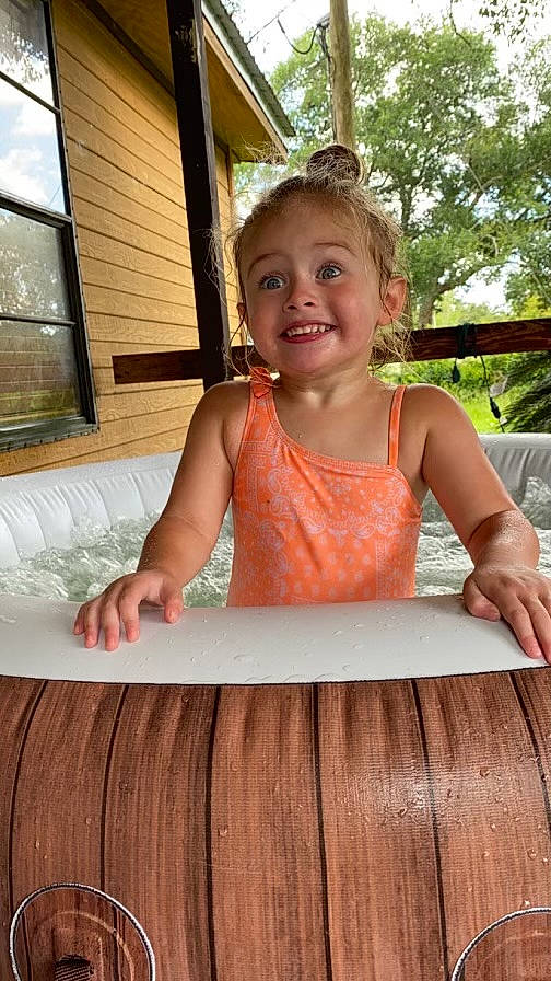 Analeigh joined the competition — help win amazing prizes! blond, child, flooring, fun, grass, happy, hardwood, joy, leisure, person, plant, roof, sitting, skin, smile, toddler, tree, varnish, vest, window