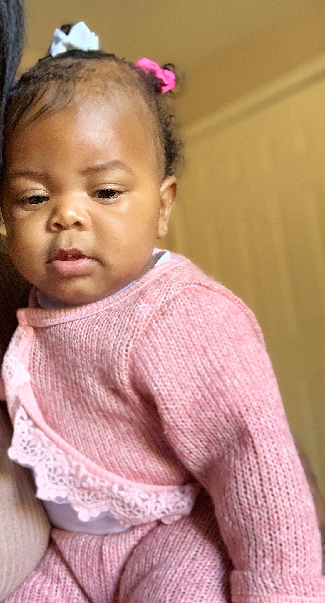 Serenity is registered to the contest to win money with this photo: baby_toddler_clothing, black_hair, cheek, chin, ear, eye, eyebrow, eyelash, face, facial_expression, forehead, hair, happy, headgear, lip, neck, nose, person, pink, skin