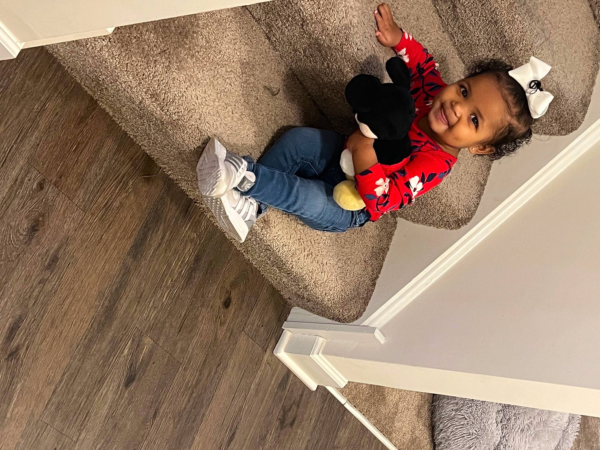 Alaiya is registered to the contest to win money with this photo: baby_toddler_clothing, carmine, child, comfort, flooring, foot, hardwood, human_body, human_leg, jeans, joy, knee, leisure, pattern, person, sitting, sock, thigh, toddler, wood