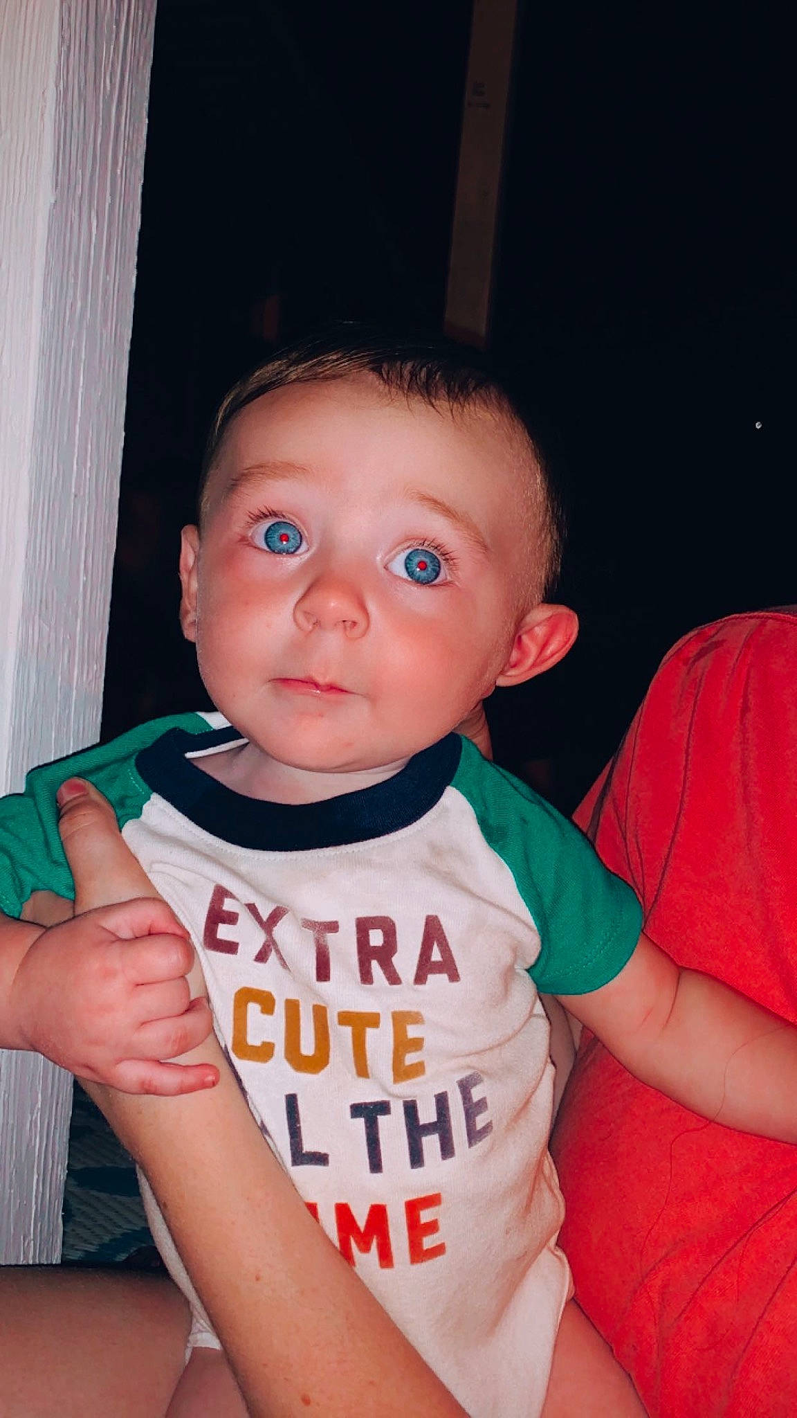 Grayson is registered to the contest to win money with this photo: arm, baby, baby_toddler_clothing, cheek, chest, eyebrow, eyelash, finger, gesture, happy, iris, lip, mouth, neck, nose, person, shoulder, skin, sleeve, t_shirt