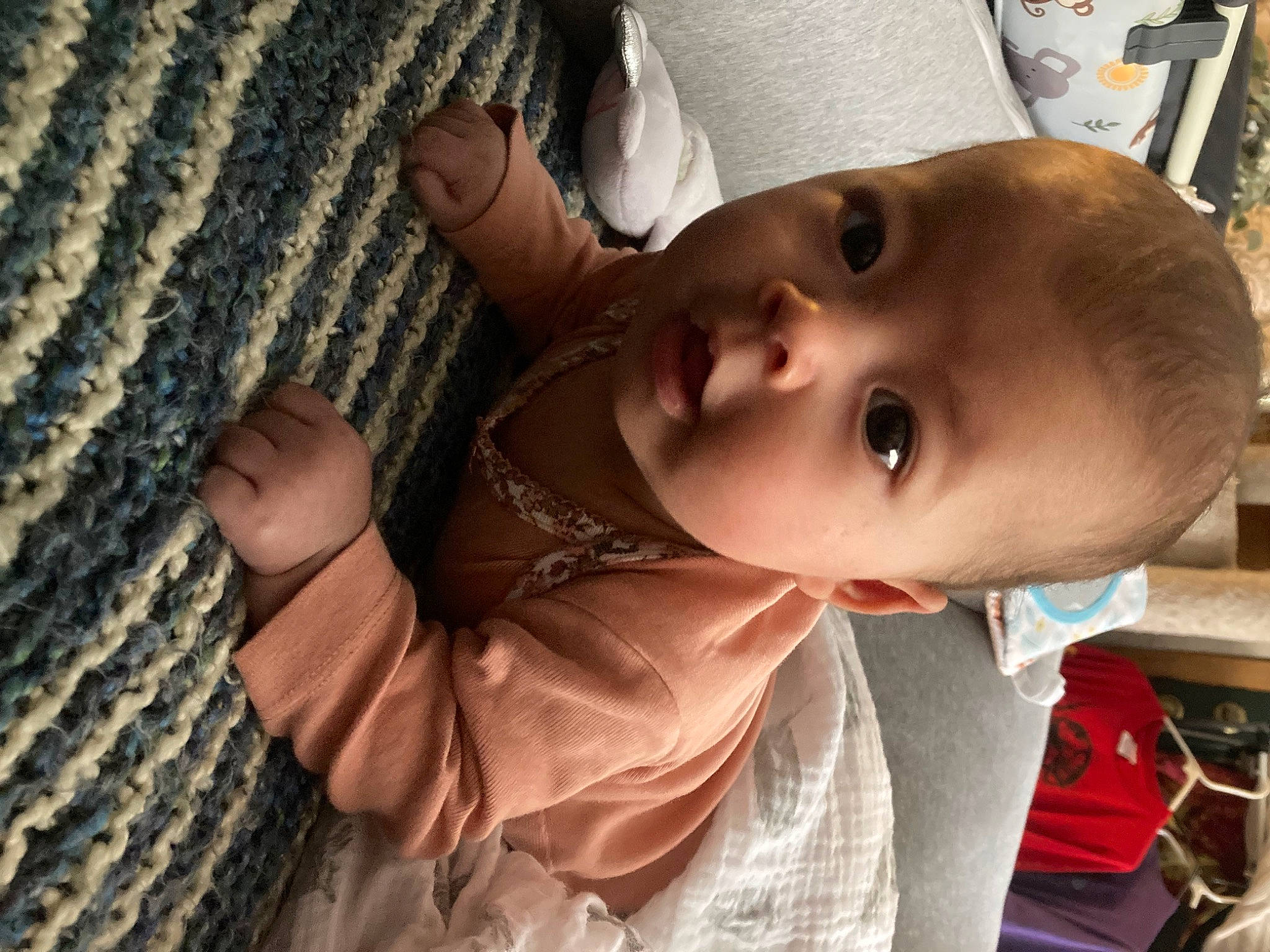 Imogen joined the competition — help win amazing prizes! baby, baby_toddler_clothing, cheek, child, eyelash, fashion_accessory, fun, happy, hat, lip, nose, pattern, person, skin, smile, toddler, tree, wood, wool, woolen