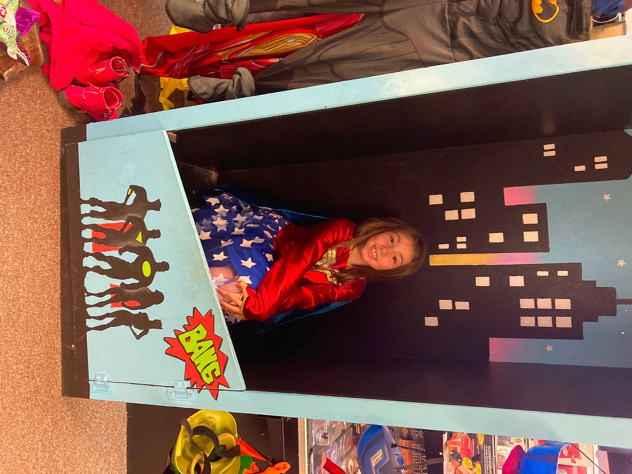 Zyriah is registered to the contest to win money with this photo: advertising, art, carmine, creative_arts, display_device, event, font, graphic_design, graphics, joy, pattern, person, rectangle, red, room, textile, visual_arts