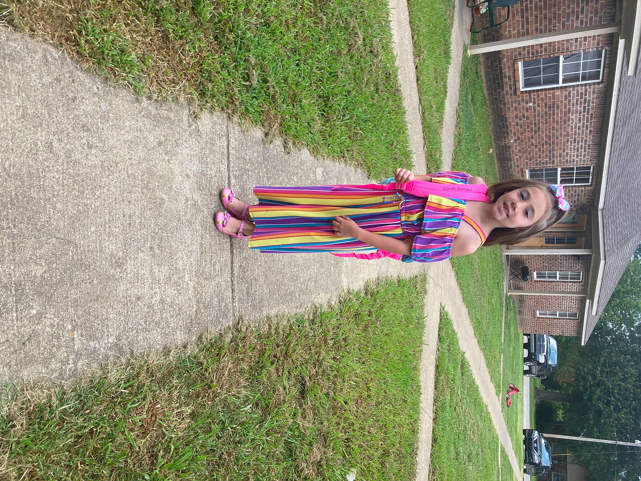 Zyriah joined the competition — help win amazing prizes! asphalt, concrete, fun, grass, landscape, leisure, line, person, plant, pole, road, road_surface, shadow, shrub, sidewalk, smile, tints_and_shades, tree, wall, window