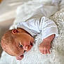 Elysio participe au concours pour gagner de l'argent avec cette photo : baby, newborn, infant, lying_down, white_blanket, soft_texture, curious, blue_eyes, cute, child, portrait, sleepwear, small_hands, indoors, closeup, skin, head, expression, peaceful, cozy