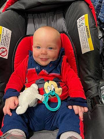 Nikolai joined the competition — help win amazing prizes! baby, baby_carriage, baby_in_car_seat, baby_products, baby_toddler_clothing, car_seat, child, comfort, happy, head, joy, lap, leisure, outerwear, person, red, sitting, skin, smile, toddler