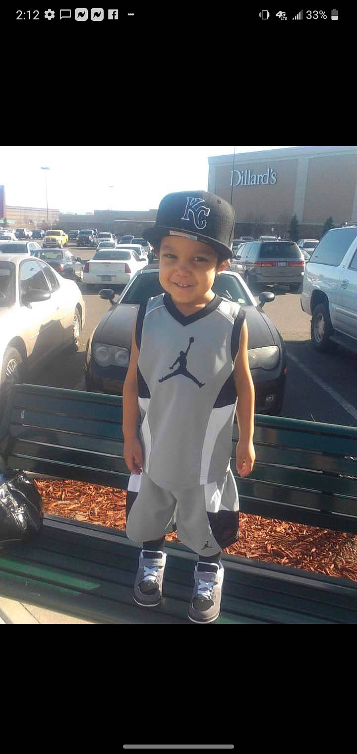 Jay is registered to the contest to win money with this photo: asphalt, automotive_design, automotive_exterior, automotive_lighting, baseball_cap, bumper, cap, car, cool, eyewear, hat, headwear, joy, land_vehicle, motor_vehicle, person, sportswear, street_fashion, tire, toy