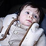 Elyass a rejoint le concours — aidez-le/la à gagner de superbes lots ! baby, child, infant, stroller, jacket, clothing, face, portrait, person, cute, fluffy, warm, eyes, hand, skin, hair, button, fabric, seated, closeup