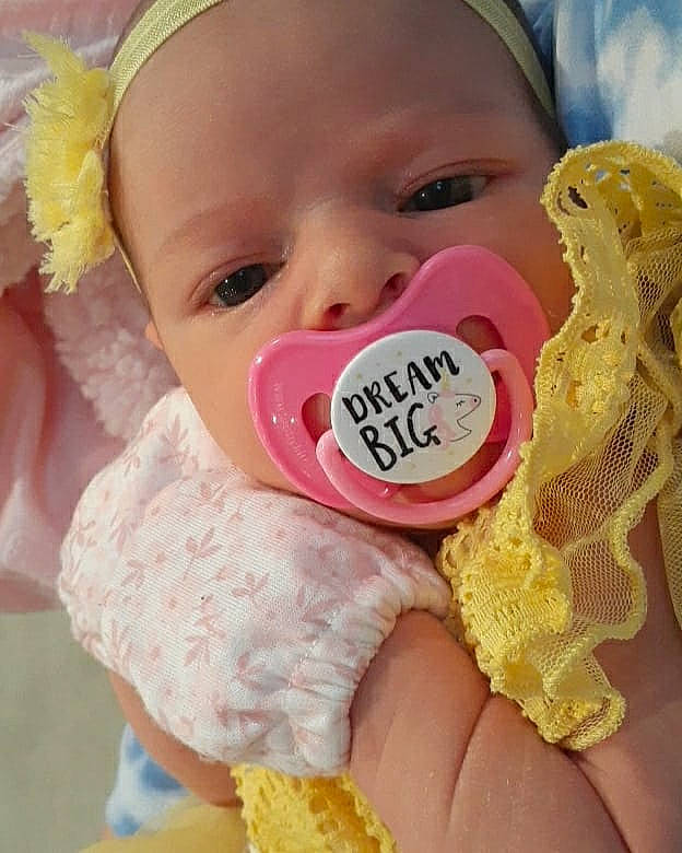 Raelynn joined the competition — help win amazing prizes! baby, baby_products, baby_sleeping, baby_toddler_clothing, cheek, child, eyelash, finger, fun, gesture, happy, lip, mouth, nail, nose, person, pink, skin, sweetness, toddler