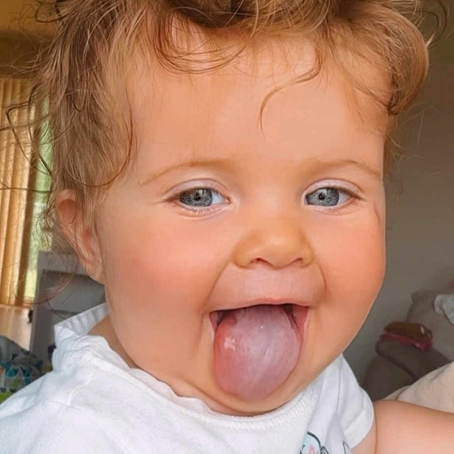 Trinity joined the competition — help win amazing prizes! baby, babylaughing, blonde, bodypart, clothing, cream, face, hair, happy, head, laughing, mouth, person, photography, portrait, selfie, smile, t_shirt, teeth, tongue