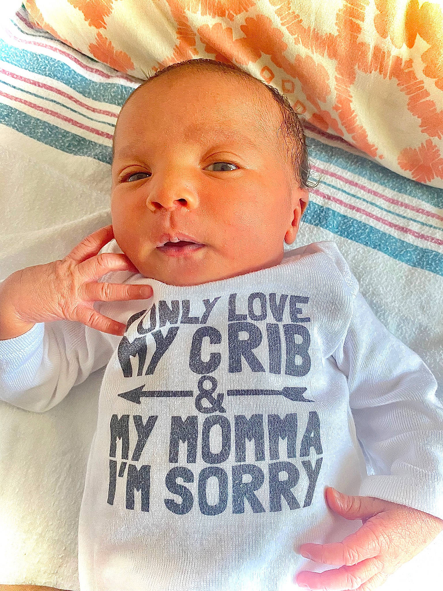 Azuré Kay is registered to the contest to win money with this photo: baby, baby_sleeping, baby_toddler_clothing, cheek, comfort, eyebrow, face, facial_expression, gesture, happy, human, lip, mouth, neck, nose, orange, person, product, skin, sleeve