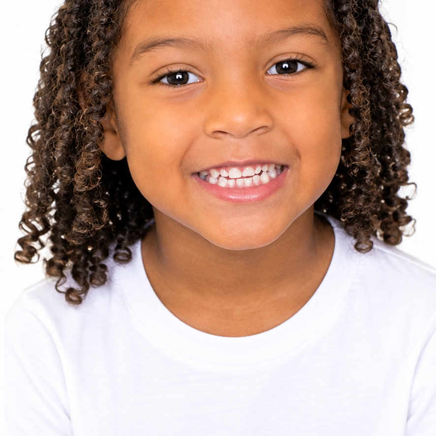 Seven joined the competition — help win amazing prizes! child, portrait, smiling, happy, curly_hair, face, teeth, eyes, white_shirt, headshot, indoors, photograph, closeup, looking_at_camera, young_person, natural_hair, brown_skin, digital_screen, phone_interface, black_background