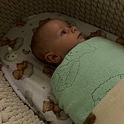 Oaklynn joined the competition — help win amazing prizes! baby, infant, blanket, bedding, bassinet, knitted, teddy_bear, sleeping_area, cozy, soft_texture, child, portrait, indoors, cute, resting, wrapped, peaceful, newborn, face, sleeping_baby