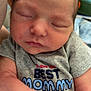 Santonio is registered to the contest to win money with this photo: newborn, baby, sleeping, infant, onesie, clothing, face, skin, arm, closeup, peaceful, cute, child, human, portrait, resting, soft, casual, indoors, person