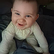 Asher joined the competition — help win amazing prizes! baby, bedroom, blanket, child, cozy, crawling, cute, expression, face, hands, happy, indoors, infant, onesie, person, portrait, skin, sleepwear, smiling, young