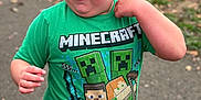 Oliver joined the competition — help win amazing prizes! boy, casual_clothing, child, curly_hair, cute, daylight, grass, green_tshirt, happy, leaves, minecraft, nature, outdoor, park, pathway, person, playful, pumpkin, short_sleeve, smiling