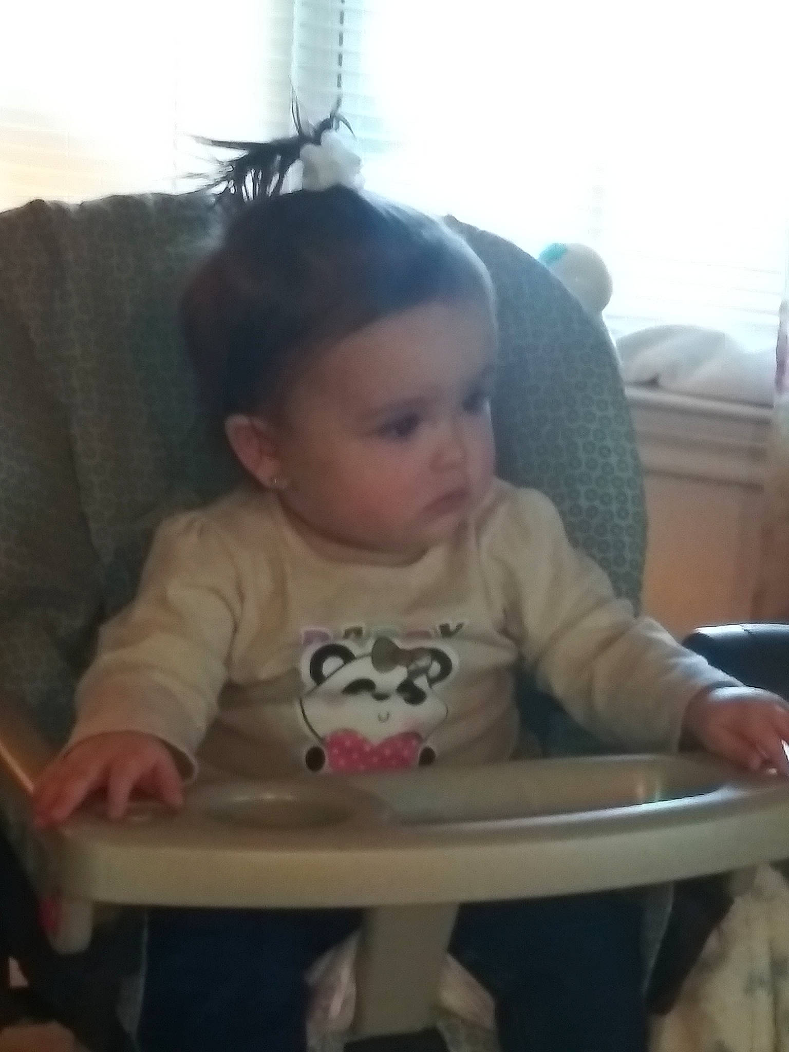 Charity is registered to the contest to win money with this photo: arm, baby_products, cheek, child, crawling, day, eye, face, finger, furniture, head, infant, leg, mouth, organ, person, play, product, sitting, skin