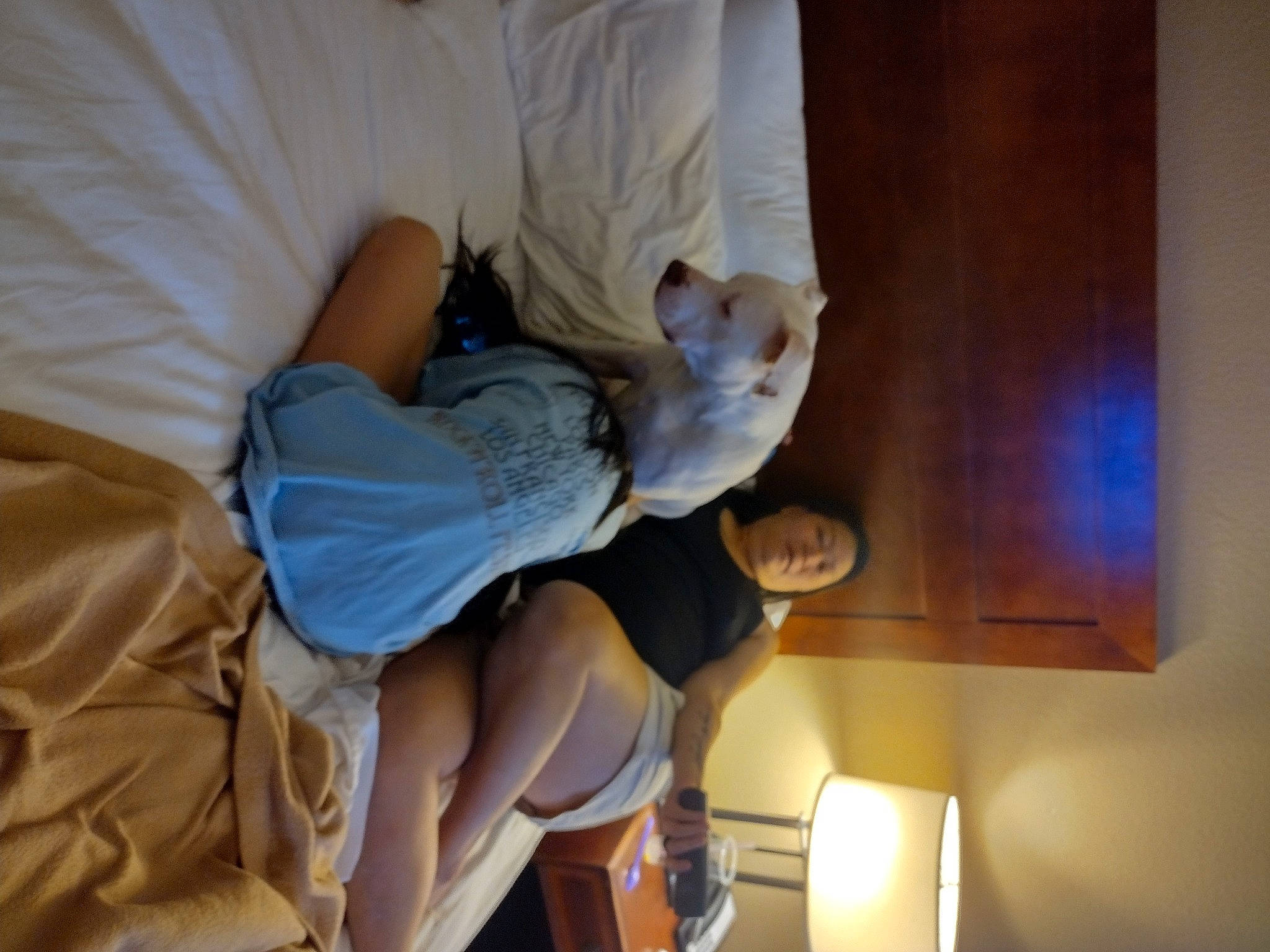 Indi is registered to the contest to win money with this photo: abdomen, child, comfort, elbow, gesture, human_leg, knee, room, sitting, thigh, wood