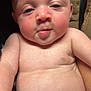 Kenzie joined the competition — help win amazing prizes! baby, infant, child, bare_chest, diaper, face, skin, expression, pout, couch, cushion, adult, closeup, indoor, human, portrait, newborn, chubby, resting, soft