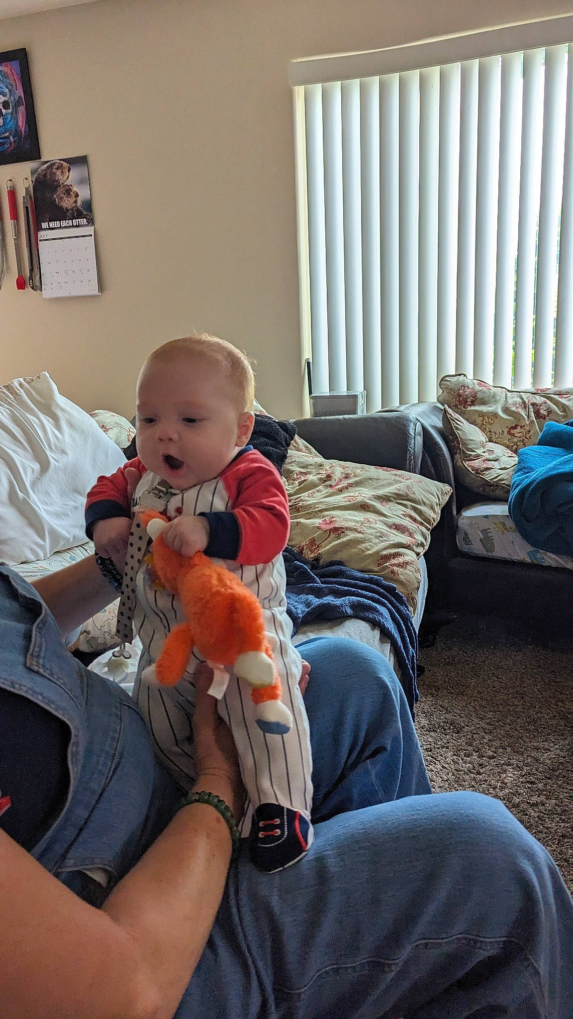 Rin joined the competition — help win amazing prizes! baby, baby_toddler_clothing, child, comfort, couch, curtain, flooring, fun, human_leg, knee, lap, linens, living_room, person, picture_frame, pillow, room, sitting, studio_couch, thigh