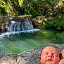 baby, sleeping, waterfall, nature, rock, arm, tattoo, greenery, outdoor, peaceful, infant, relaxation, sunlight, portrait, freshwater, calm, skin, scenery, daytime, rest