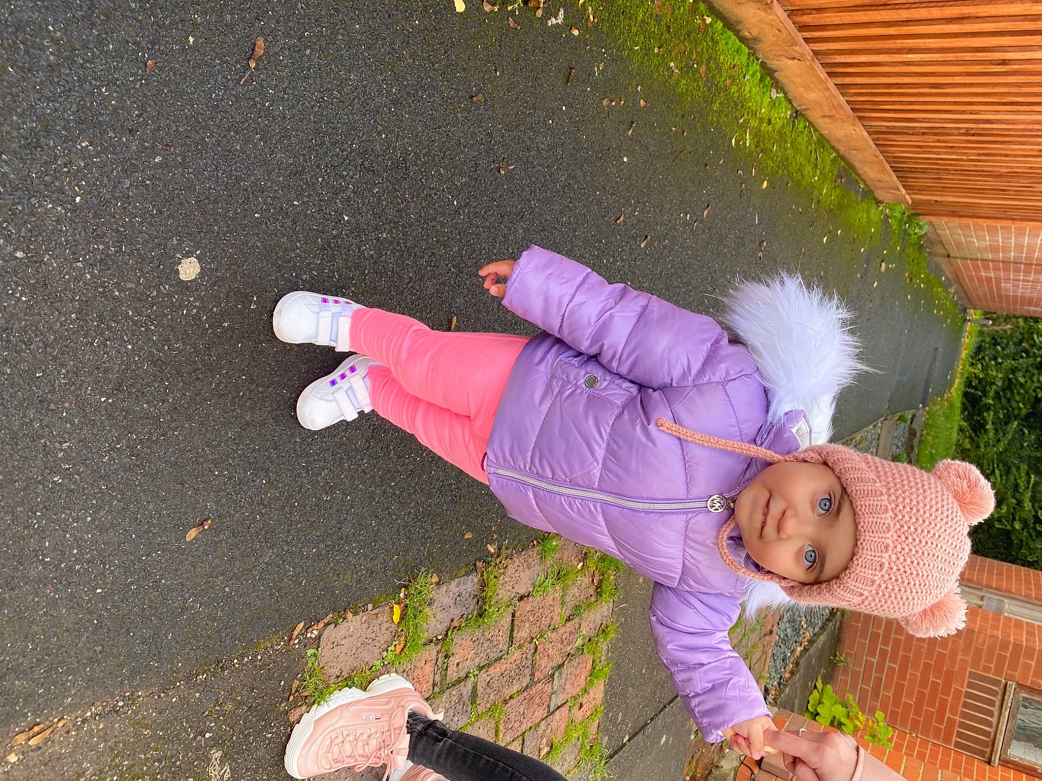 Rebecca is registered to the contest to win money with this photo: asphalt, baby, baby_toddler_clothing, child, costume, fun, garden, grass, hat, headwear, joy, lawn_ornament, leisure, magenta, people_in_nature, person, pink, plant, road_surface, sidewalk