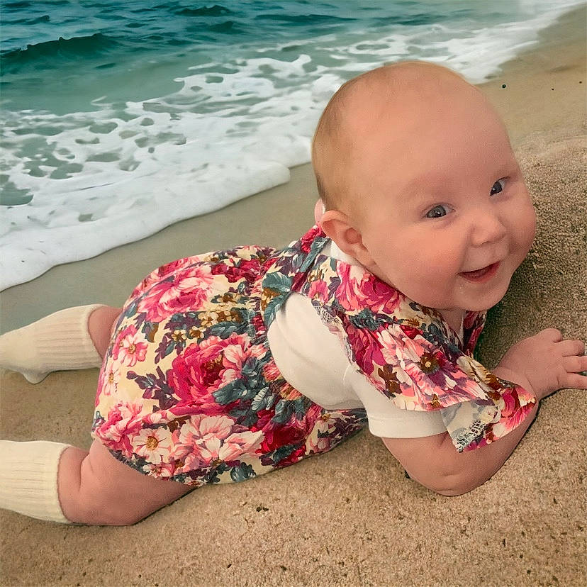 Bonnie joined the competition — help win amazing prizes! baby, baby_toddler_clothing, beach, beauty, coastal_and_oceanic_landforms, fun, hairstyle, happy, human, leg, leisure, natural_environment, people_in_nature, people_on_beach, person, sand, shore, toddler, travel, vertebrate