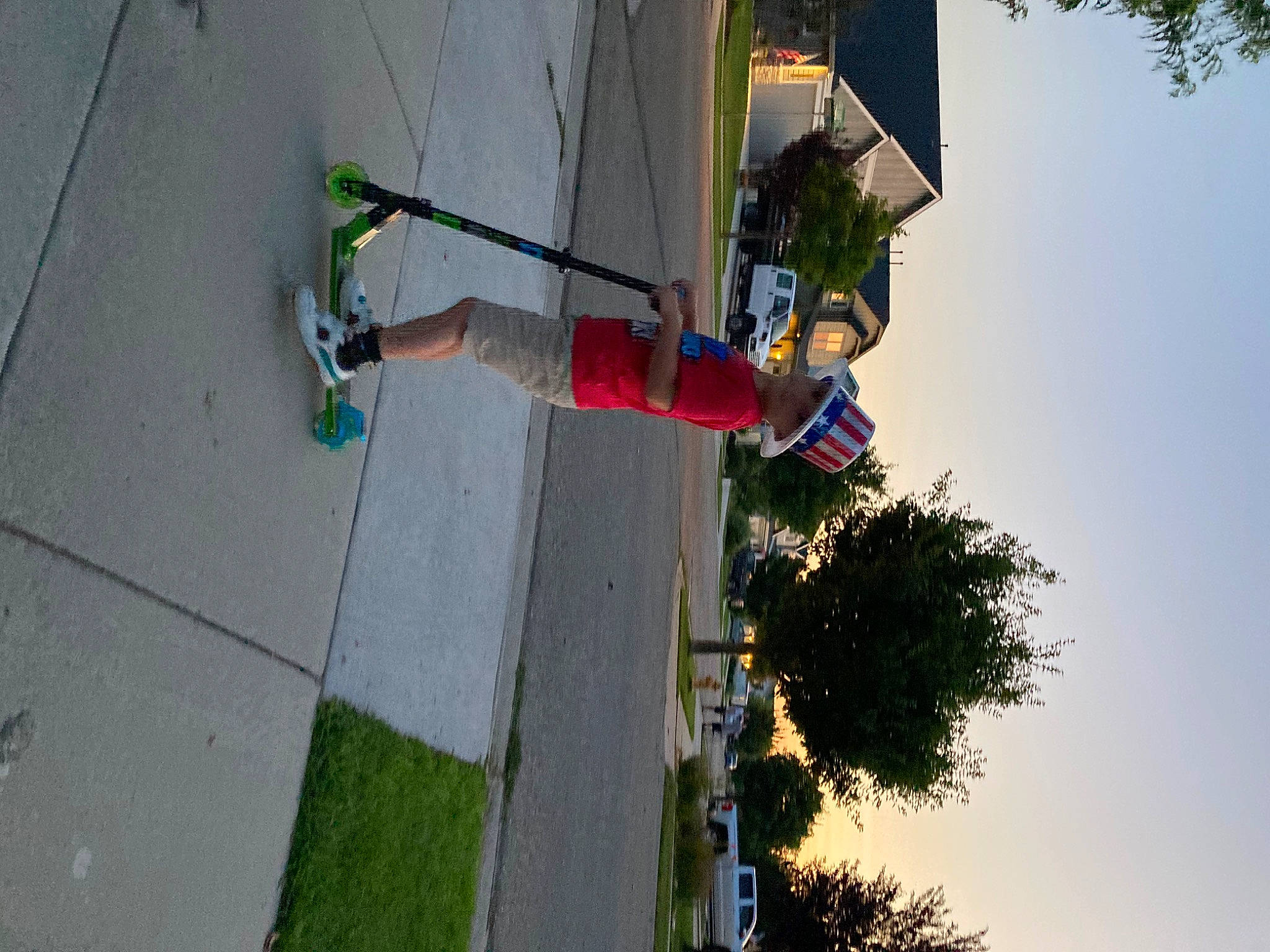 Owen joined the competition — help win amazing prizes! adventure, asphalt, fun, green, leisure, line, person, plant, pole, recreation, road, road_surface, shadow, sidewalk, sky, slope, sports_equipment, street, tree, walking_shoe