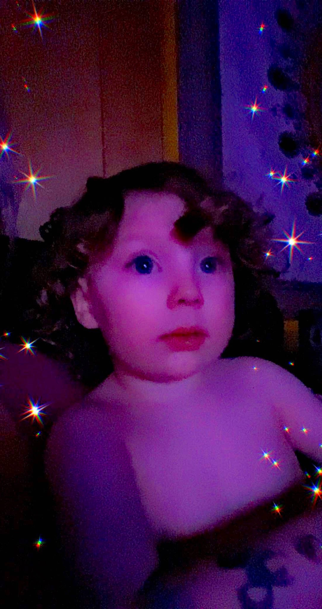 Ariya joined the competition — help win amazing prizes! christmas_ornament, electric_blue, event, eye, eyelash, face, flash_photography, fun, hair, happy, holiday, light, lighting, magenta, ornament, person, pink, purple, space, toddler