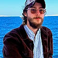 Mathew R.