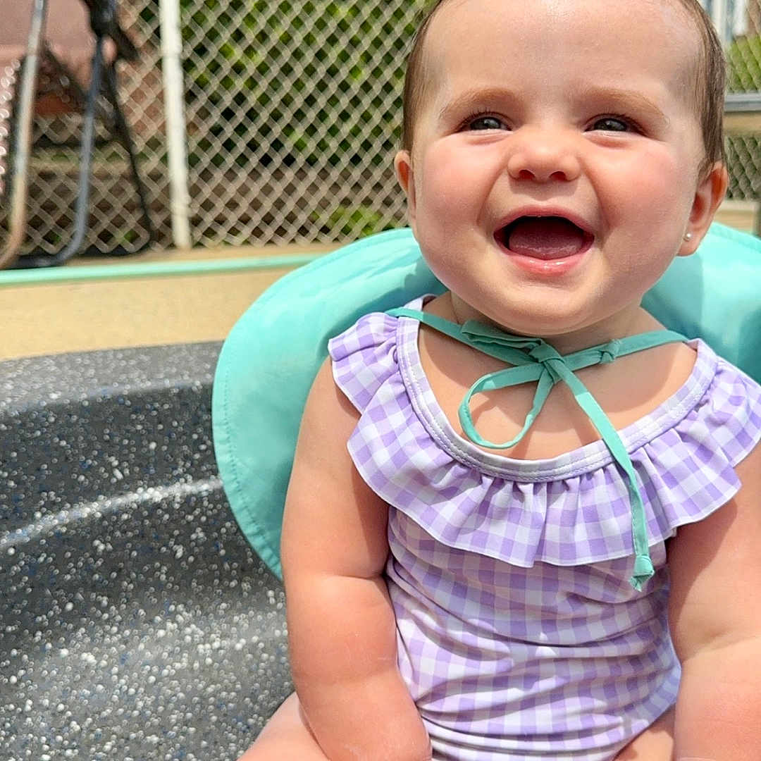 Saylor joined the competition — help win amazing prizes! baby, backyard, face, fence, grass, happy, head, laughing, nature, outdoorplayarea, outdoors, person, photography, plant, playarea, pool, portrait, summer, water, yard