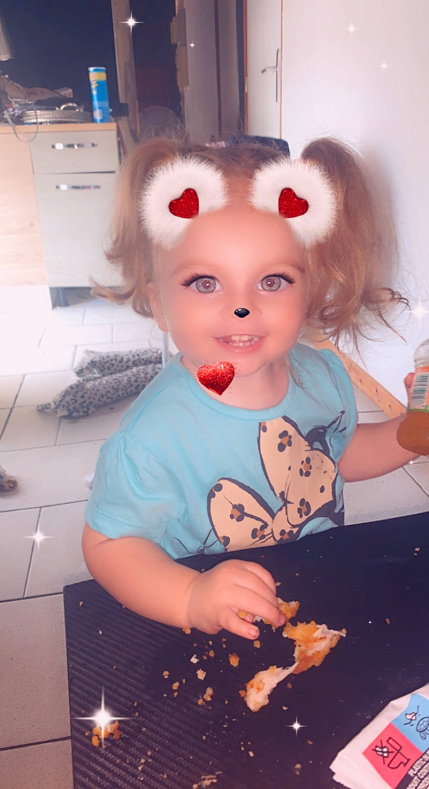 Maëlys a rejoint le concours — aidez-le/la à gagner de superbes lots ! cabinetry, child, cooking, costume, ear, eyelash, fawn, fun, fur, hairstyle, happy, headwear, kitchen_appliance, mouth, party, person, plush, room, stuffed_toy, t_shirt