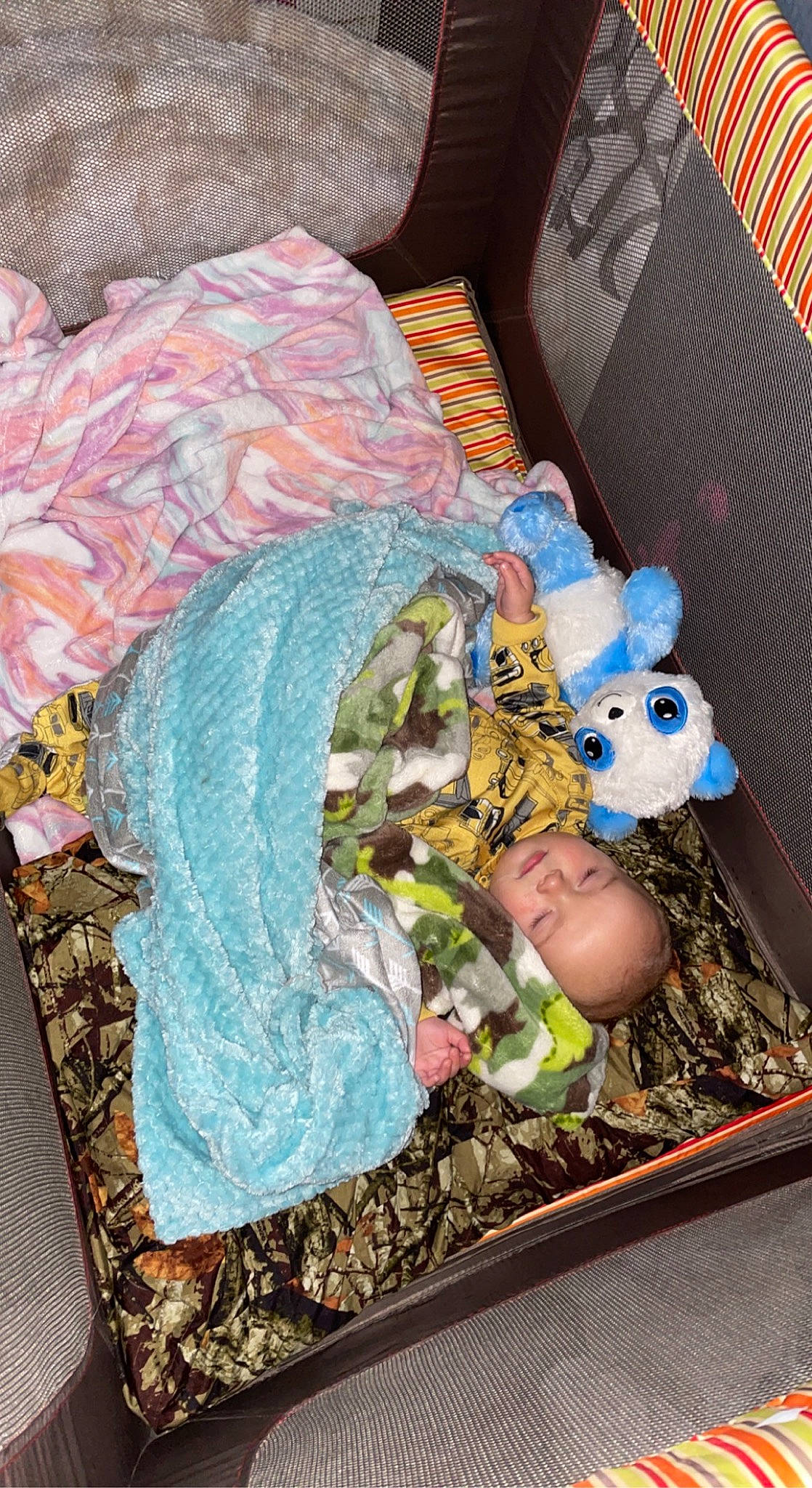 Colt is registered to the contest to win money with this photo: art, baby_toddler_clothing, bedding, comfort, couch, doll, electric_blue, fashion_accessory, fictional_character, headgear, linens, pattern, person, pink, plastic, plastic_bag, product, sleeve, stuffed_toy, textile