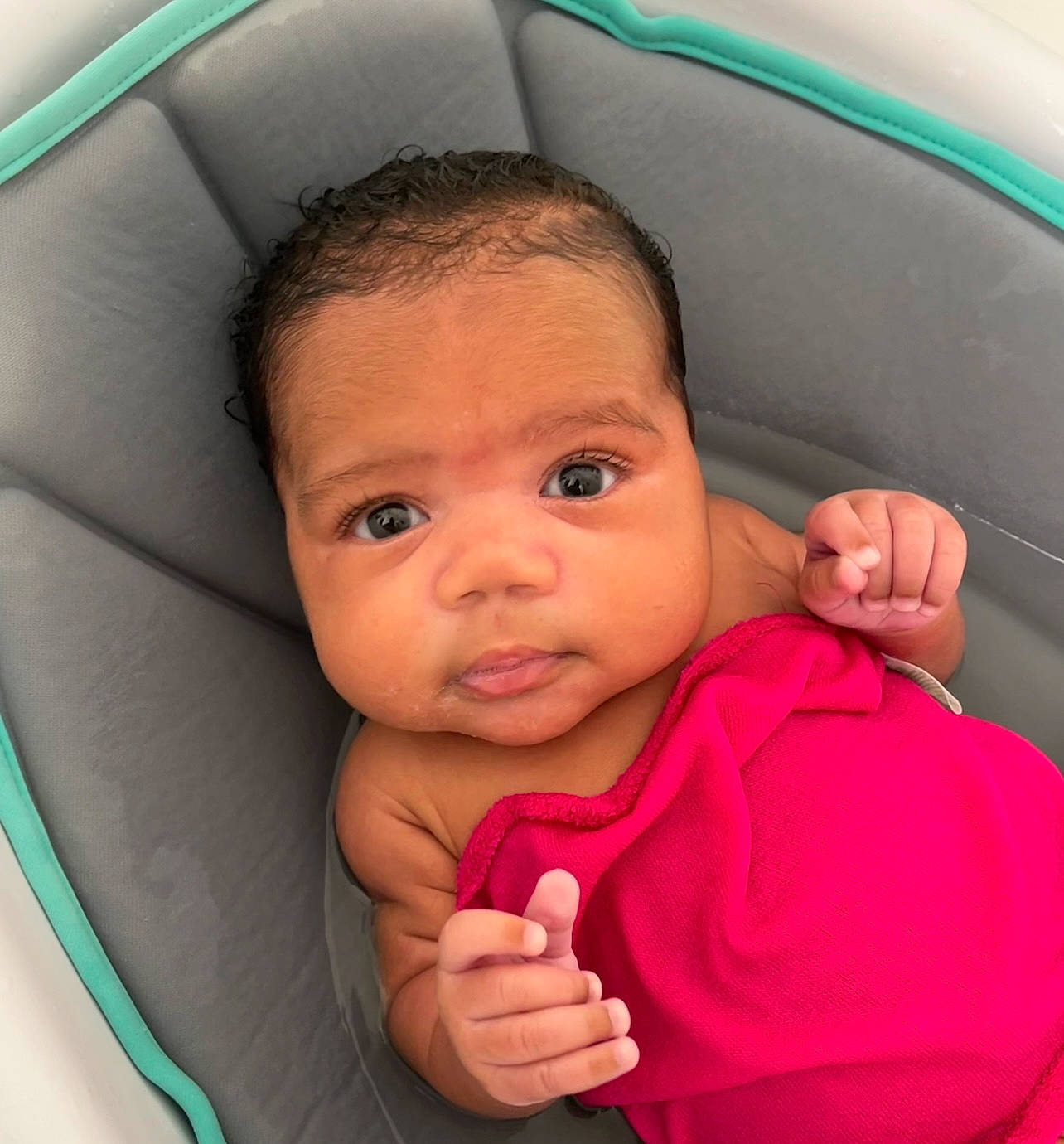 Celine is registered to the contest to win money with this photo: baby, baby_toddler_clothing, cheek, chin, comfort, facial_expression, finger, fun, gesture, hand, happy, lip, mouth, nose, organ, person, pink, product, skin, thumb