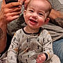 Stanley Cash joined the competition — help win amazing prizes! baby, smiling, pajamas, spoon, plate, adult, man, phone, tattoo, indoor, happy, child, family, seated, door, long_sleeve, patterned_clothing, facial_hair, candid, home