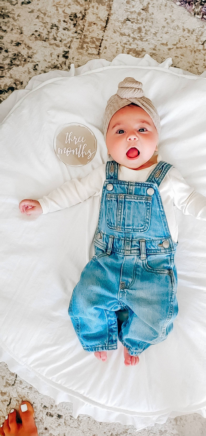 Maeve joined the competition — help win amazing prizes! baby, baby_products, baby_toddler_clothing, bow_tie, cap, denim, doll, electric_blue, fashion_accessory, fashion_design, gesture, headwear, outerwear, pattern, person, pink, product, sleeve, t_shirt, textile