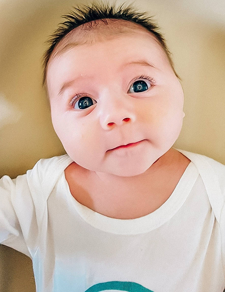 Maeve joined the competition — help win amazing prizes! baby, baby_toddler_clothing, cheek, child, comfort, eye, eyelash, flash_photography, happy, iris, lip, no_expression, nose, pattern, person, portrait_photography, sleeve, toddler