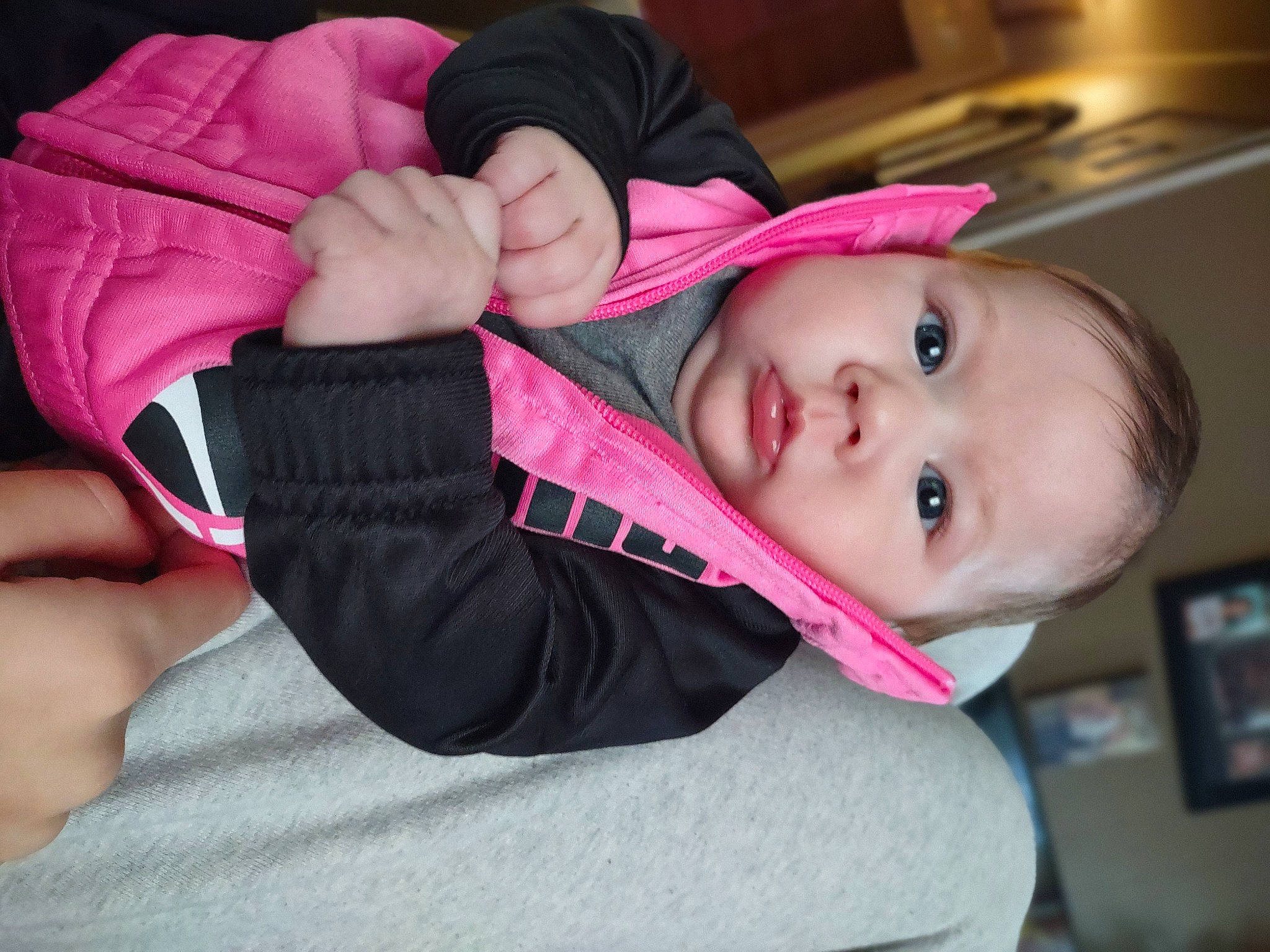 Averi joined the competition — help win amazing prizes! baby, baby_toddler_clothing, cheek, chin, comfort, eye, eyebrow, eyelash, finger, gesture, human_body, iris, lip, mouth, nose, person, pink, skin, sleeve, smile