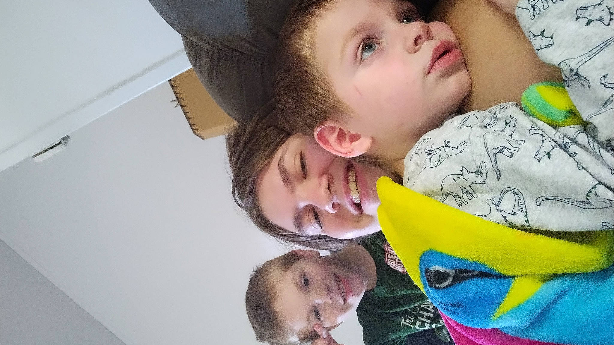 Jason is registered to the contest to win money with this photo: baby, baby_products, cheek, child, comfort, event, facial_expression, fun, gesture, happy, joy, laugh, leisure, mouth, nose, person, play, room, smile, toddler