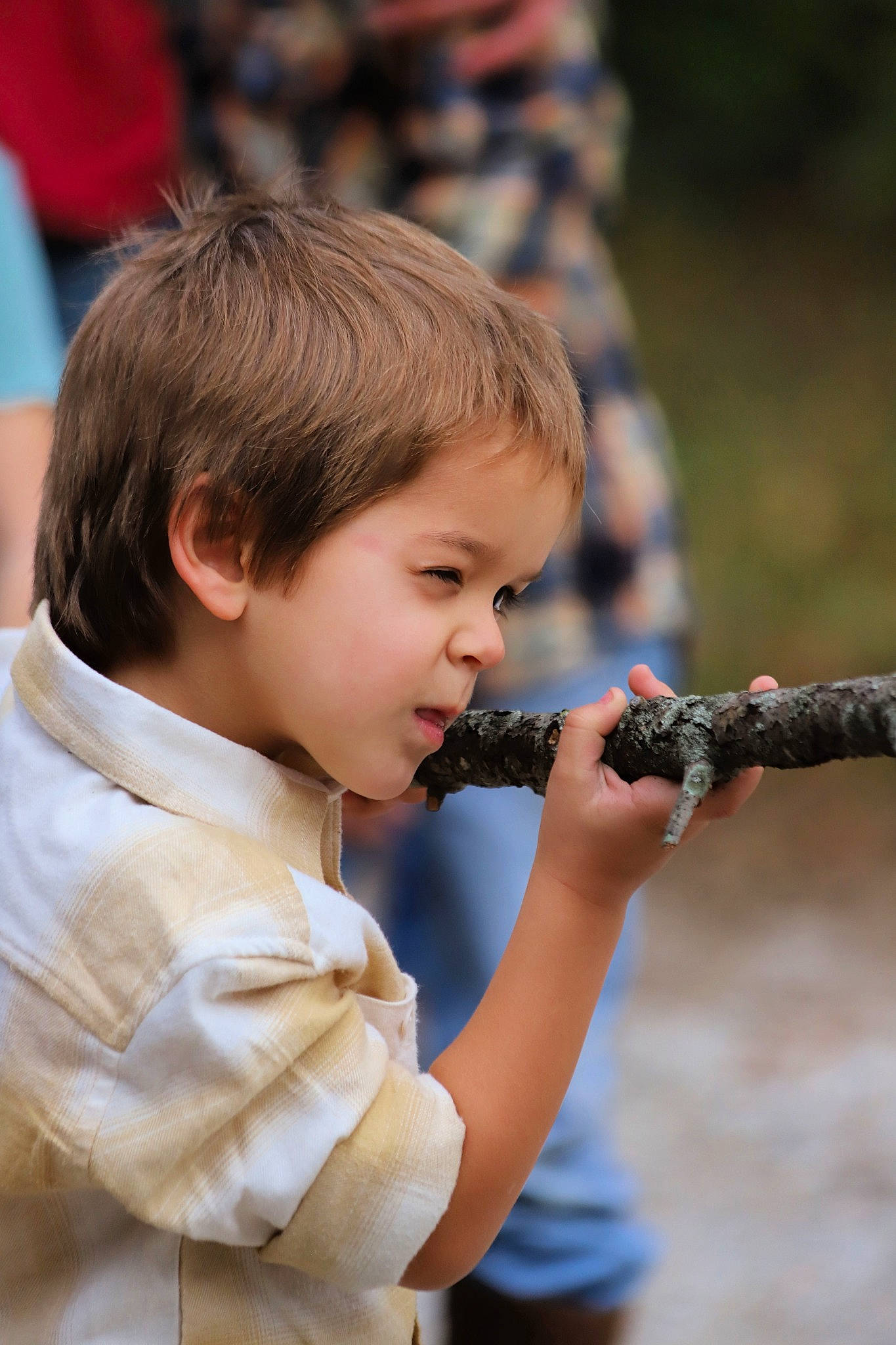 Tobias is registered to the contest to win money with this photo: championship, child, chin, competition_event, event, flautist, fun, hairstyle, happy, music, musical_instrument, musician, person, recreation, reed_instrument, t_shirt, toddler, tradition, tree, wind_instrument