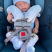 Damien is registered to the contest to win money with this photo: baby, cap, car, car_interior, carseat, clothing, cushion, face, hat, head, homedecor, medication, newborn, person, photography, pill, portrait, sleeping, transportation, vehicle